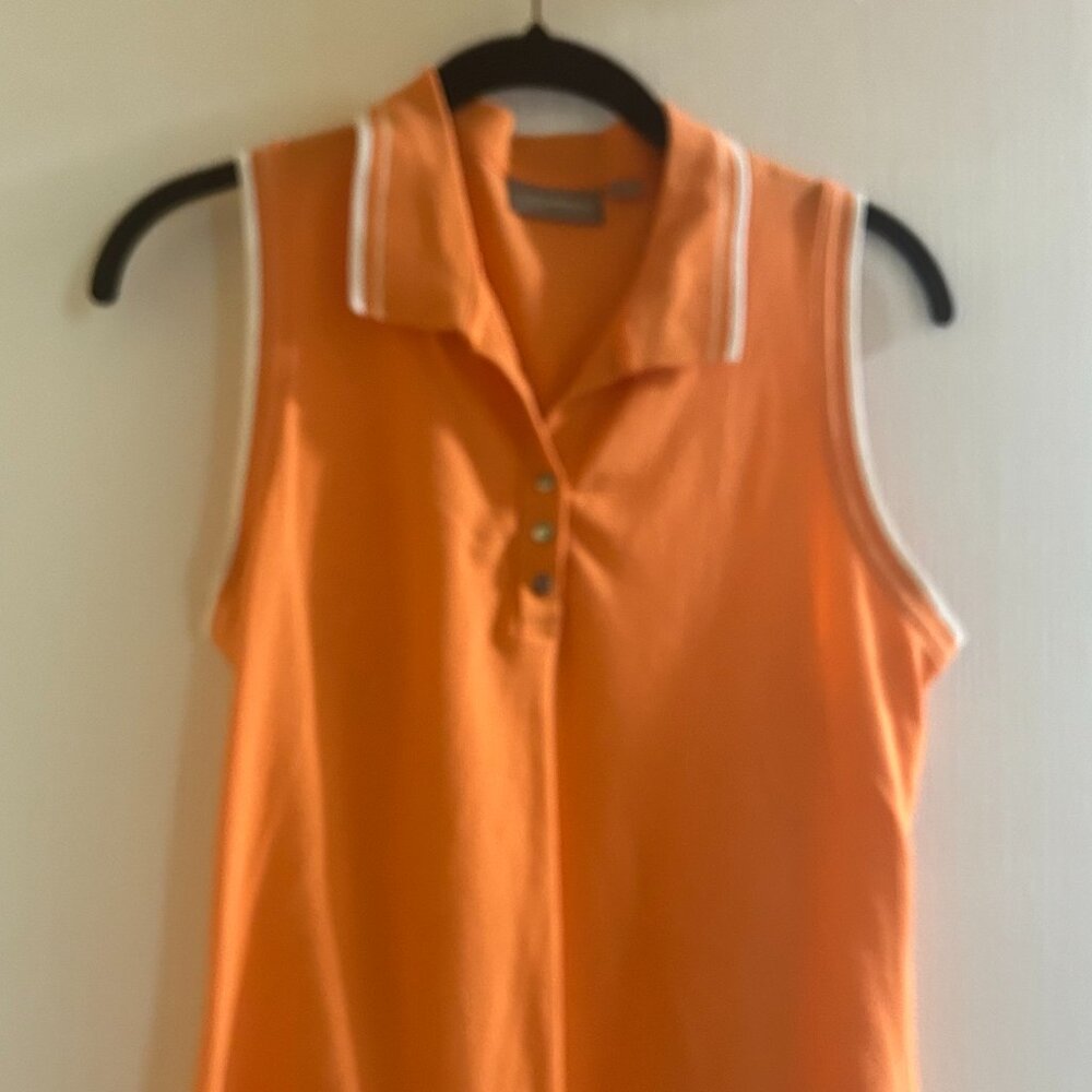 Size Medium Orange with white trim golf shirt with collar
